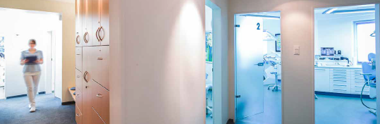 nurse walking into doctors office