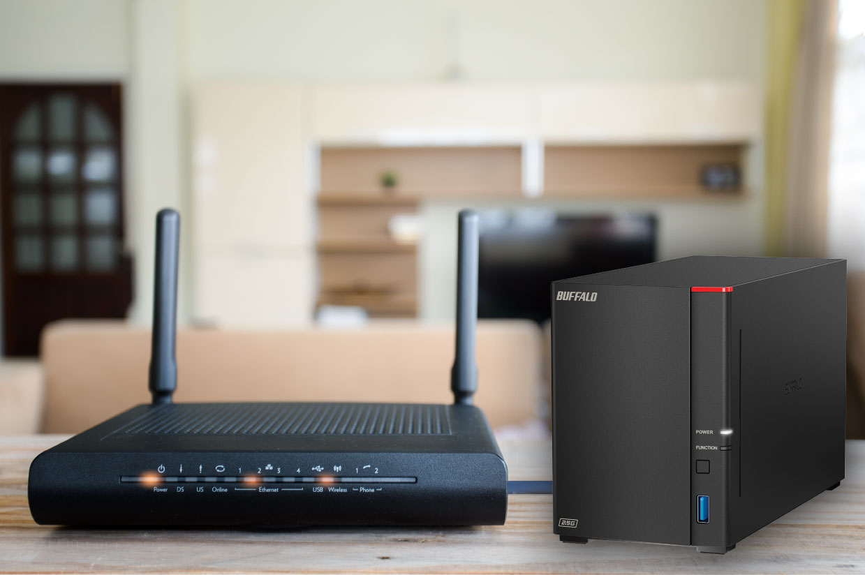 buffalo nas linkstation 720 connected to black router with blurry background of a living room